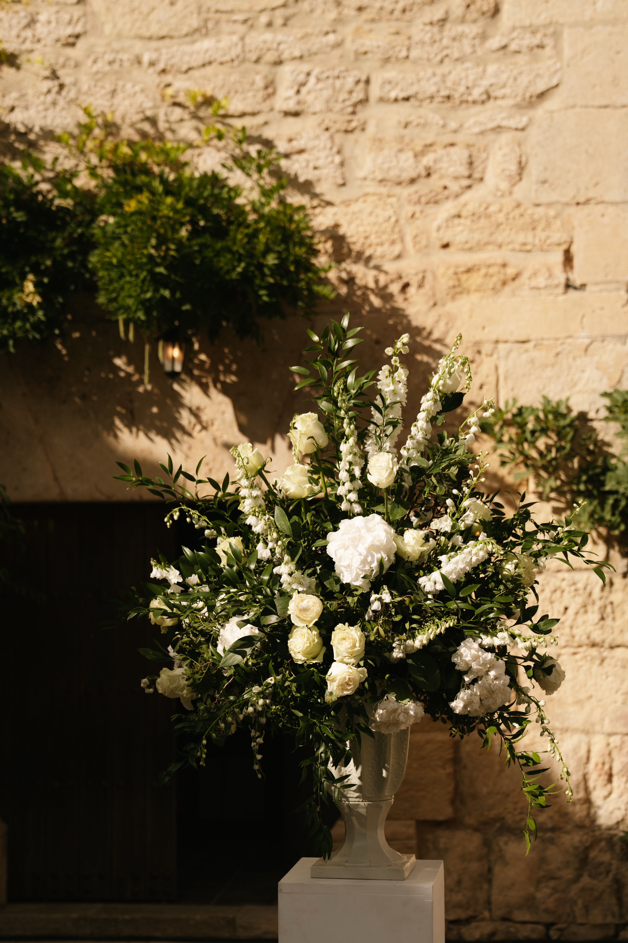 White florals at the chapel door